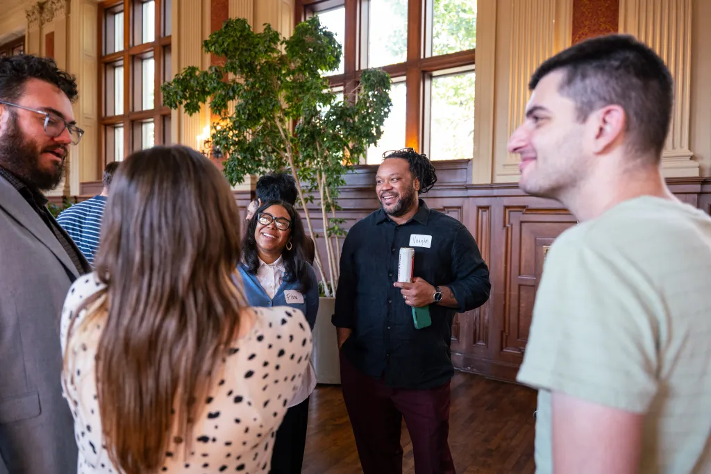 Fiona Vaughn stnads with her husband and members of the SDS and Math departments